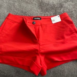 Red express shorts with tags extra buttons never worn